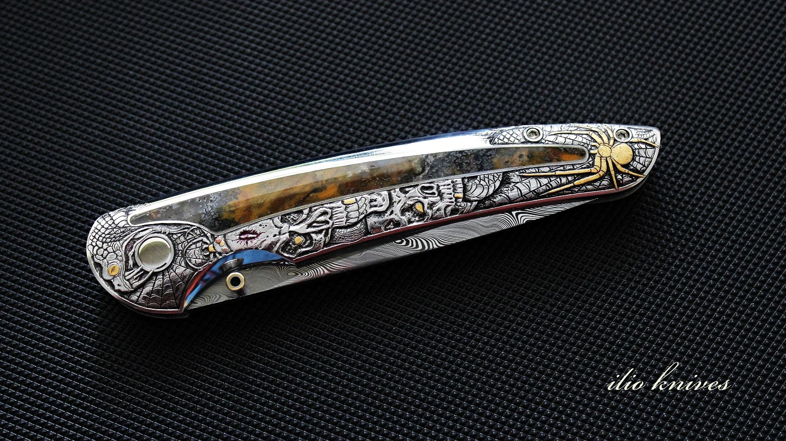 Reverse side of the closed Memento Mori engraved folding knife