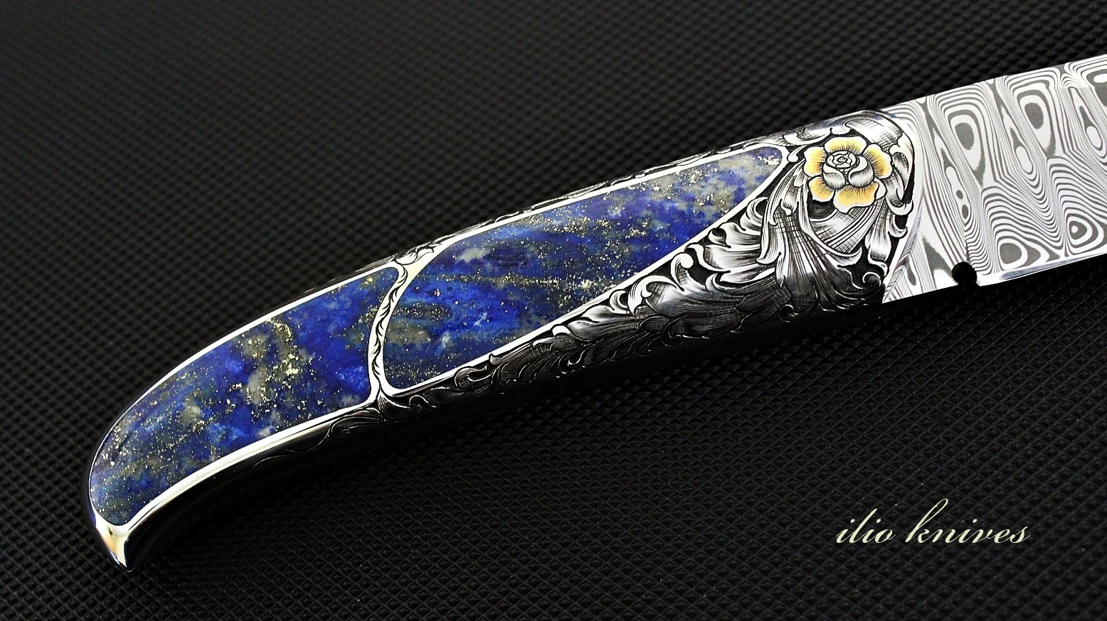 Damasteel,lazurite gemstone,engraving,gold 24k.